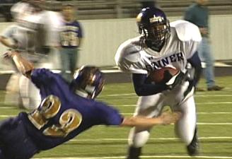 Wright avoids a tackler