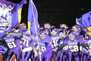 The Shiner Comanches charge the field